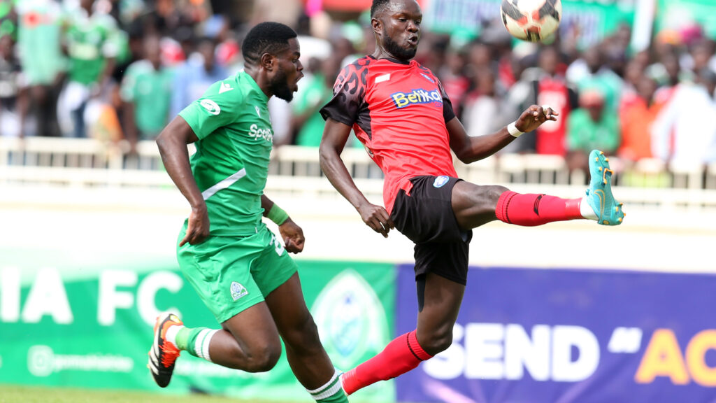 AFC Leopards defender Ken Owino controls the ball under pressure from Benson Omalla of Gor Mahia.